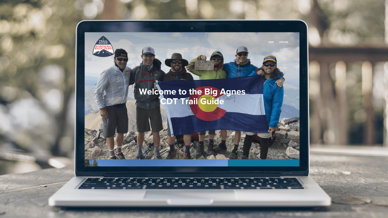 A laptop shows the Big Agnes guide to the CDT.