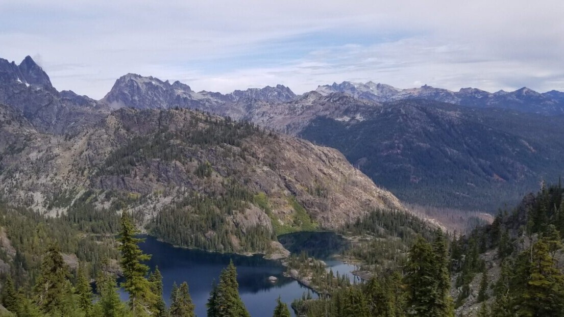 A beautiful view of a mountain and lake.