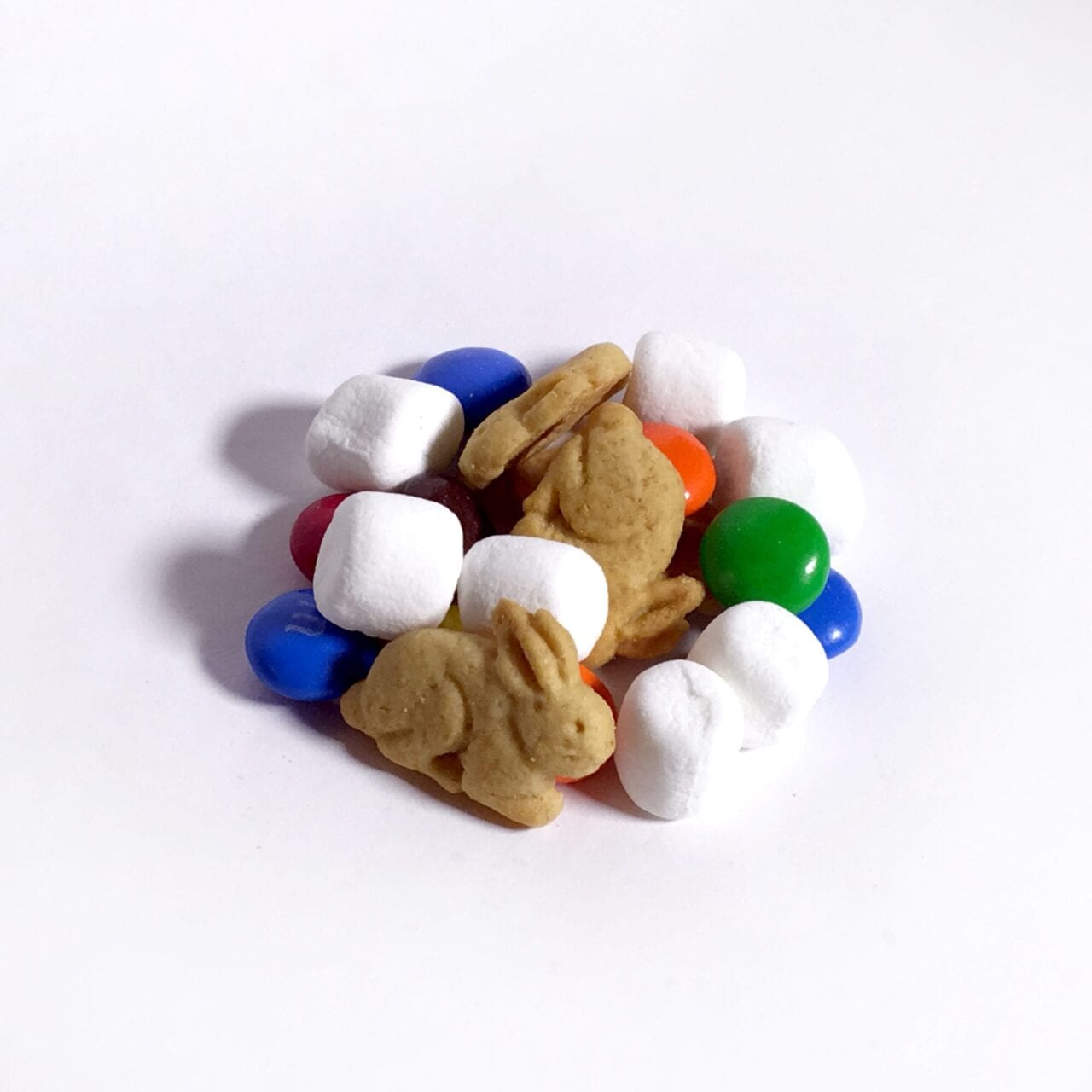 A pile of GORP trail mix including m&ms and marshmallows.