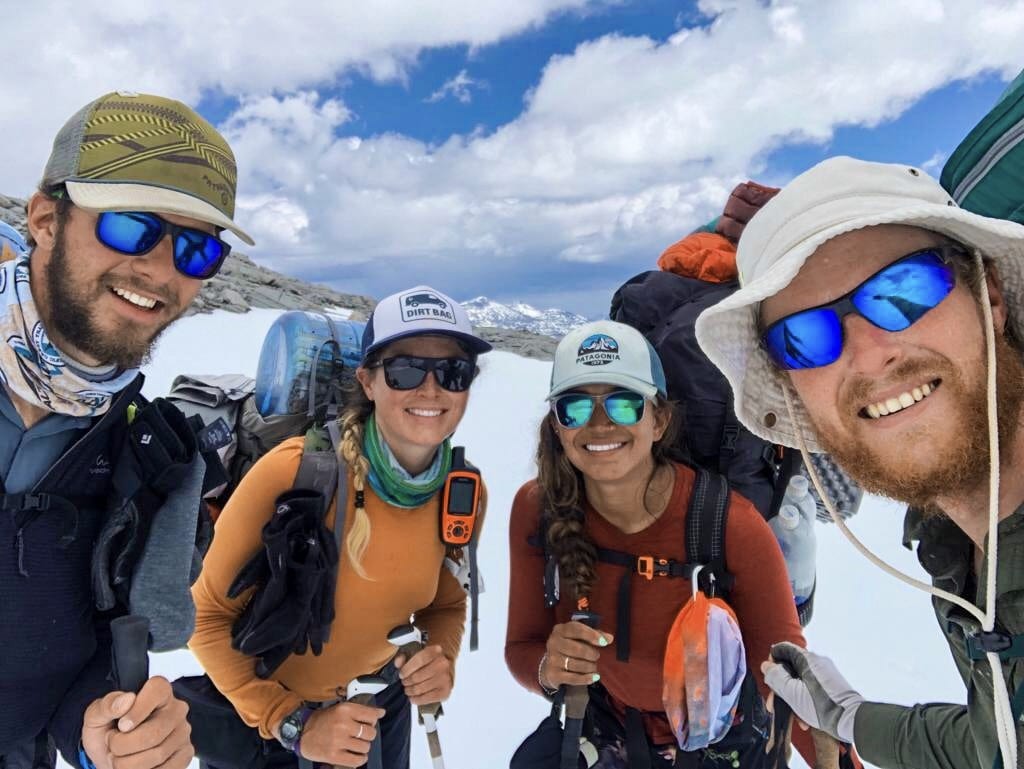A group pf hikers smiling on the Pacific Crest Trail.