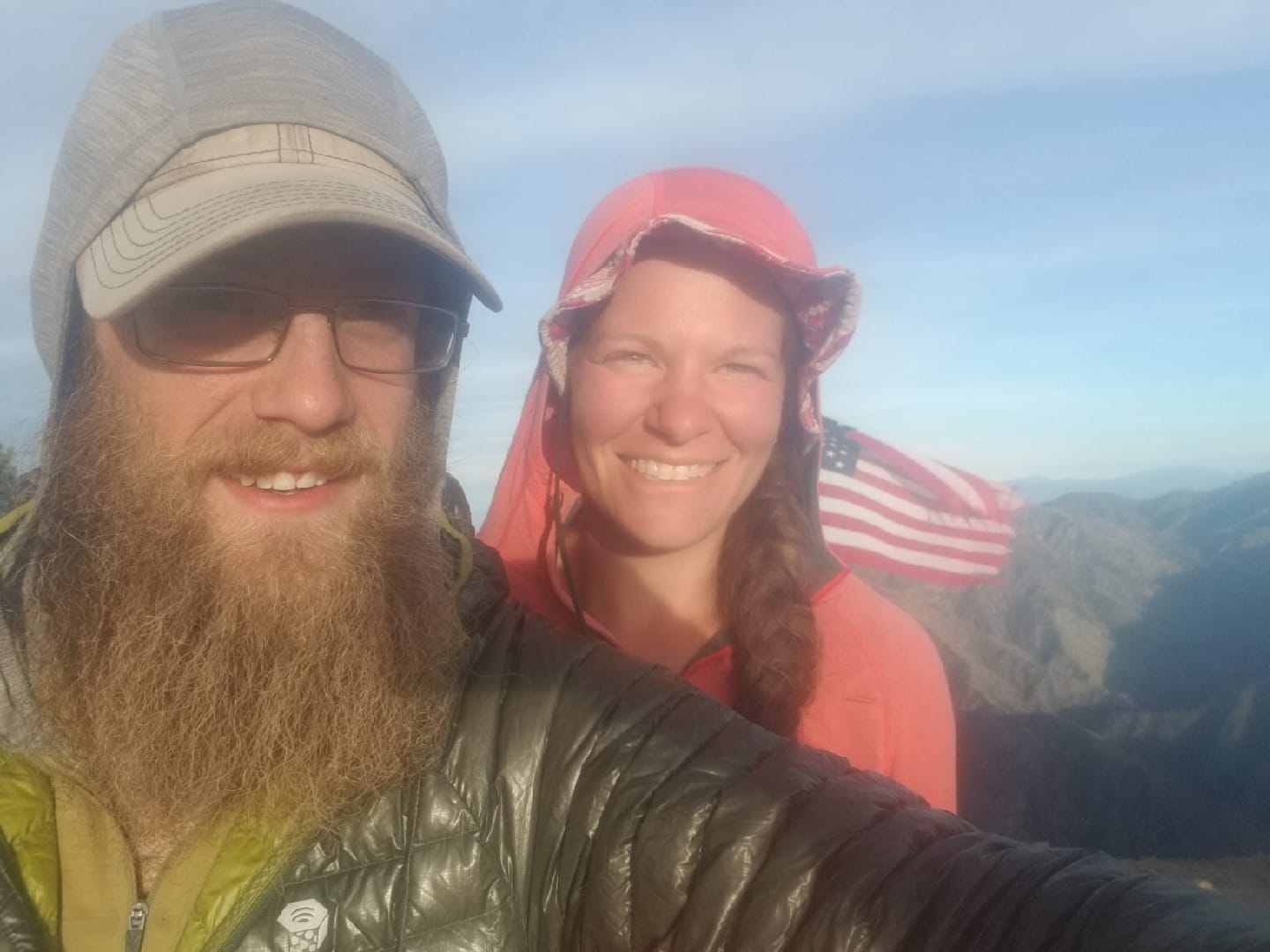 A man and a woman smiling.