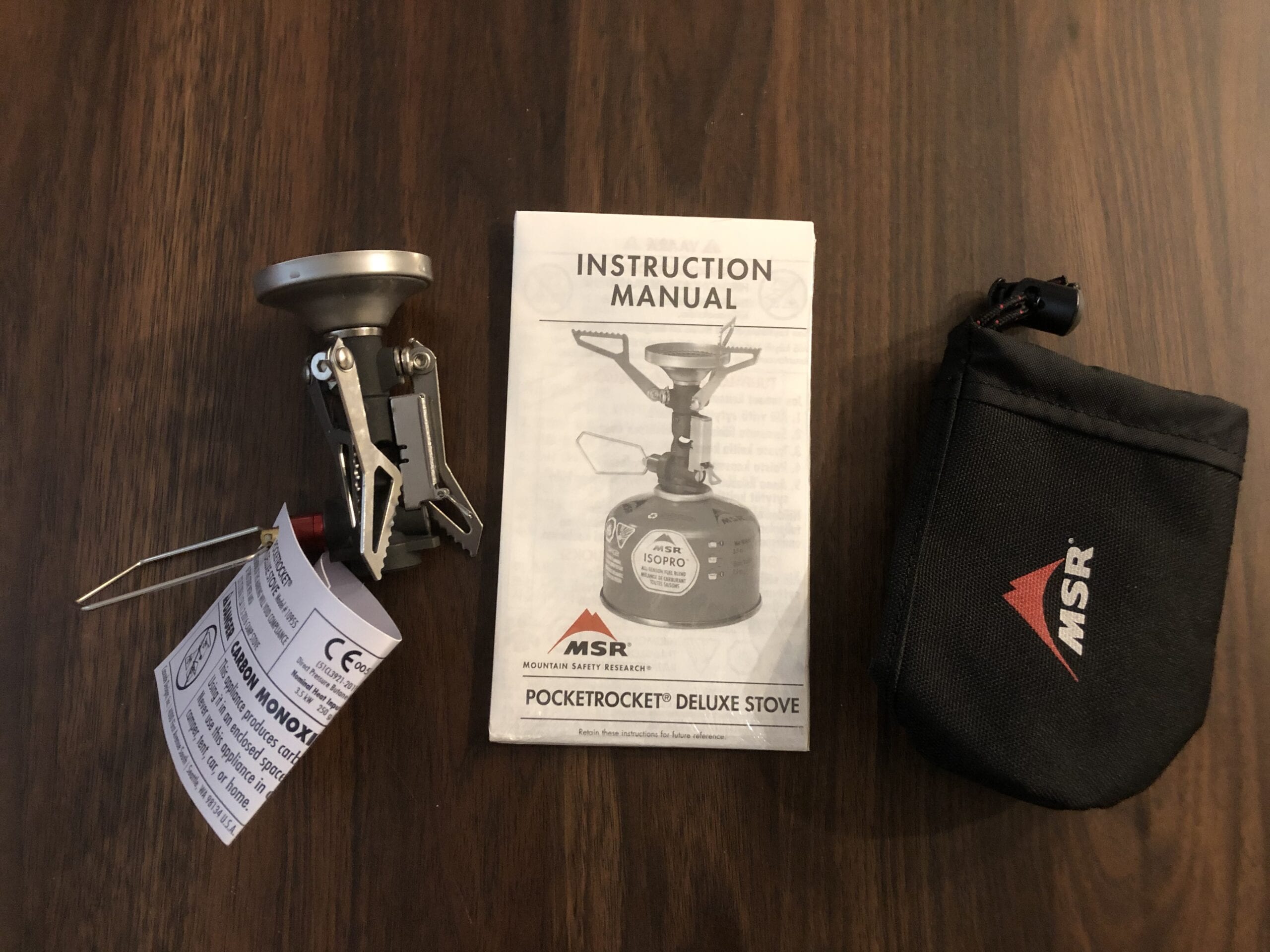 The MSR PocketRocket Deluxe stove with it's case and instructions.
