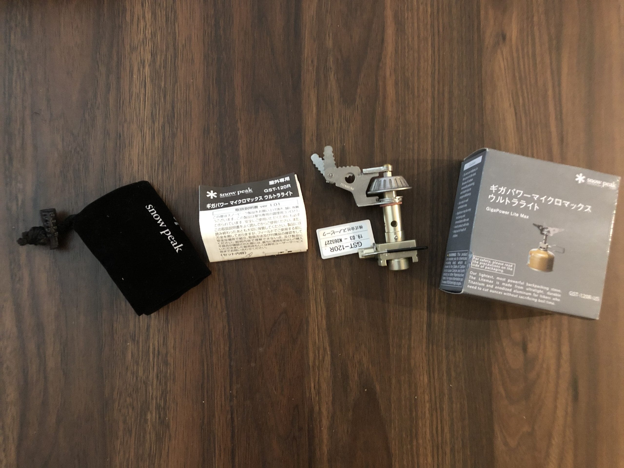 The Snow Peak LiteMax Stove with its case and instructions.