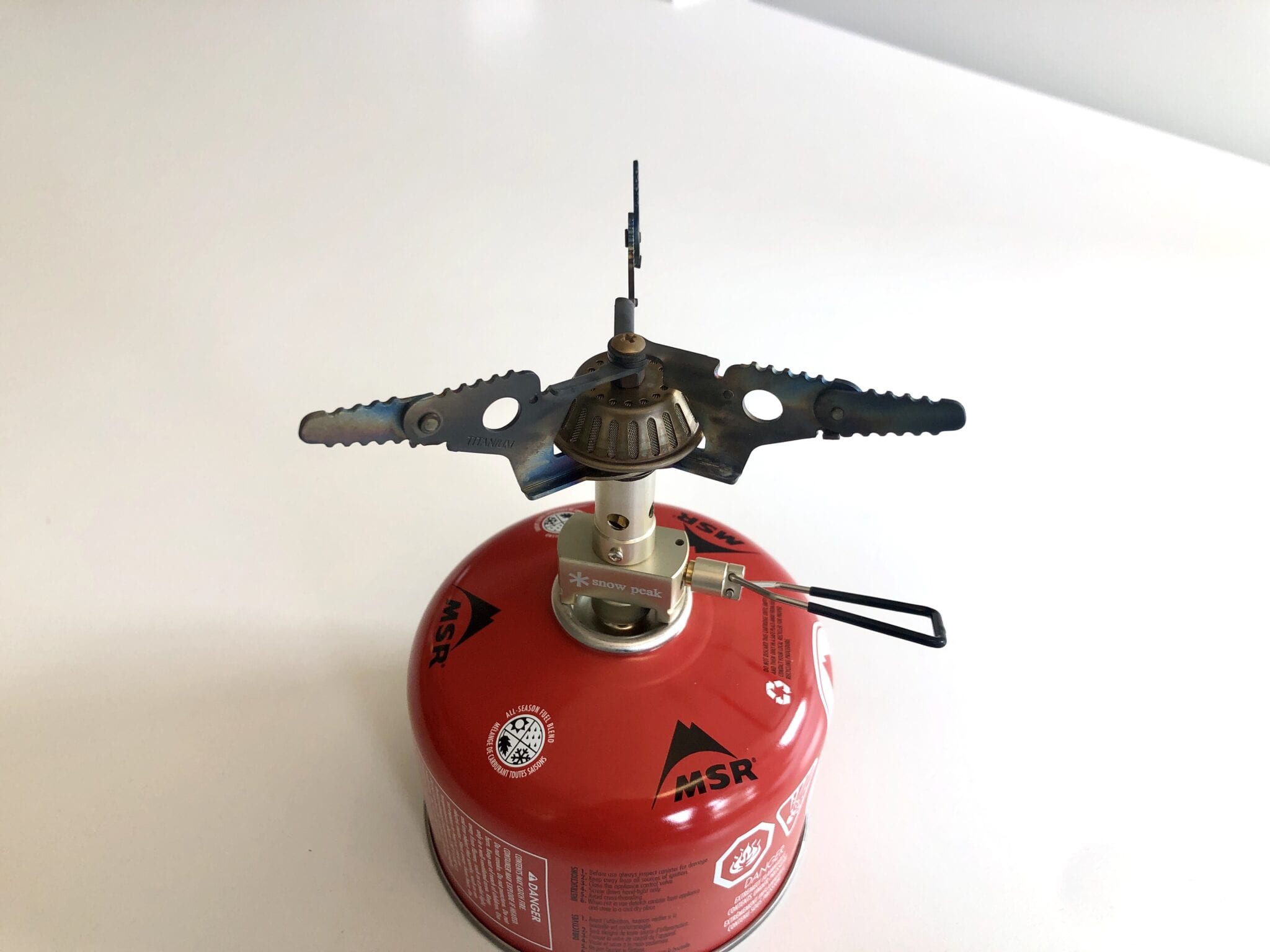 The Snow Peak LiteMax stove attached to a fuel canister.