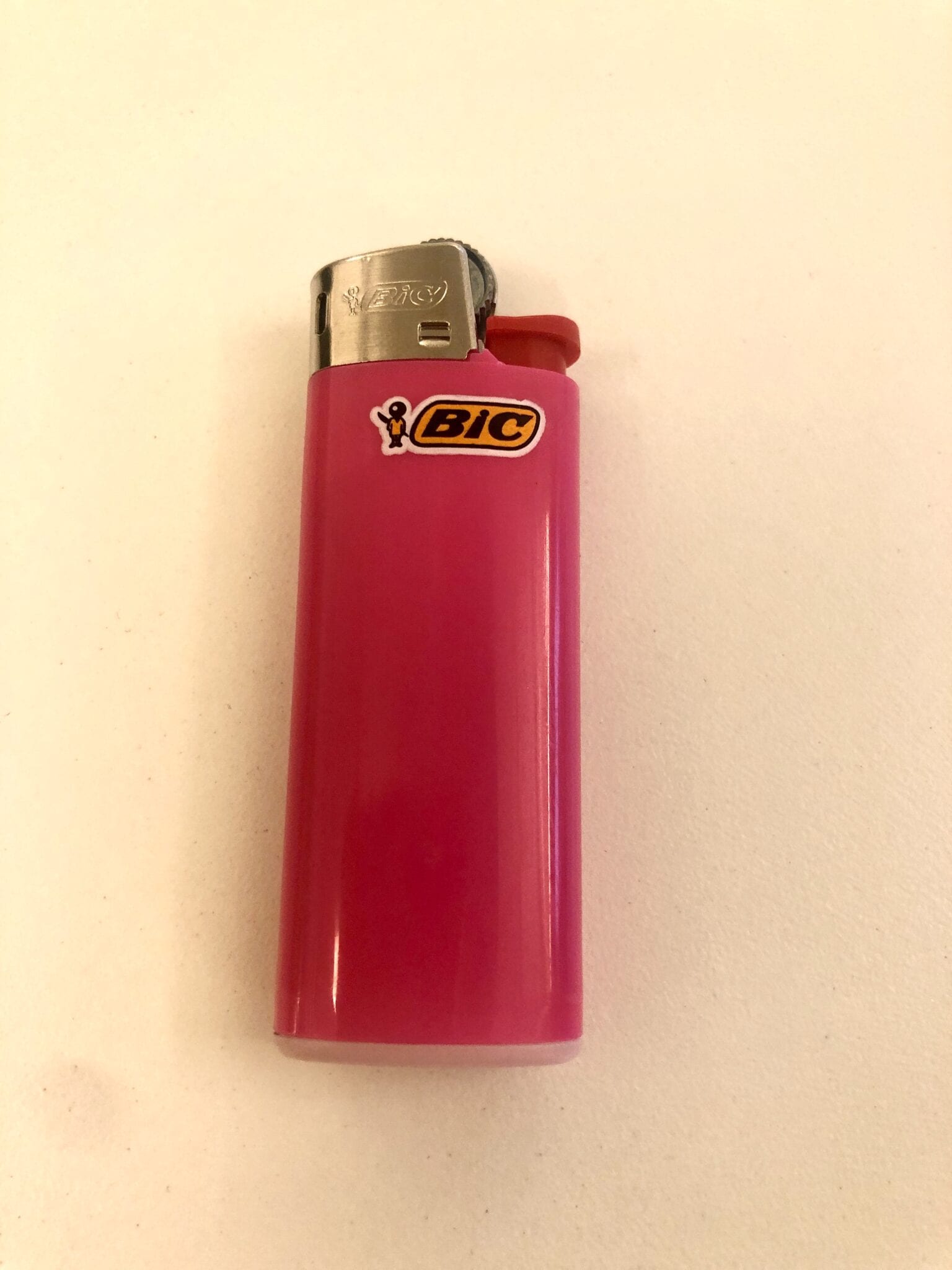 A pink BIC mini lighter