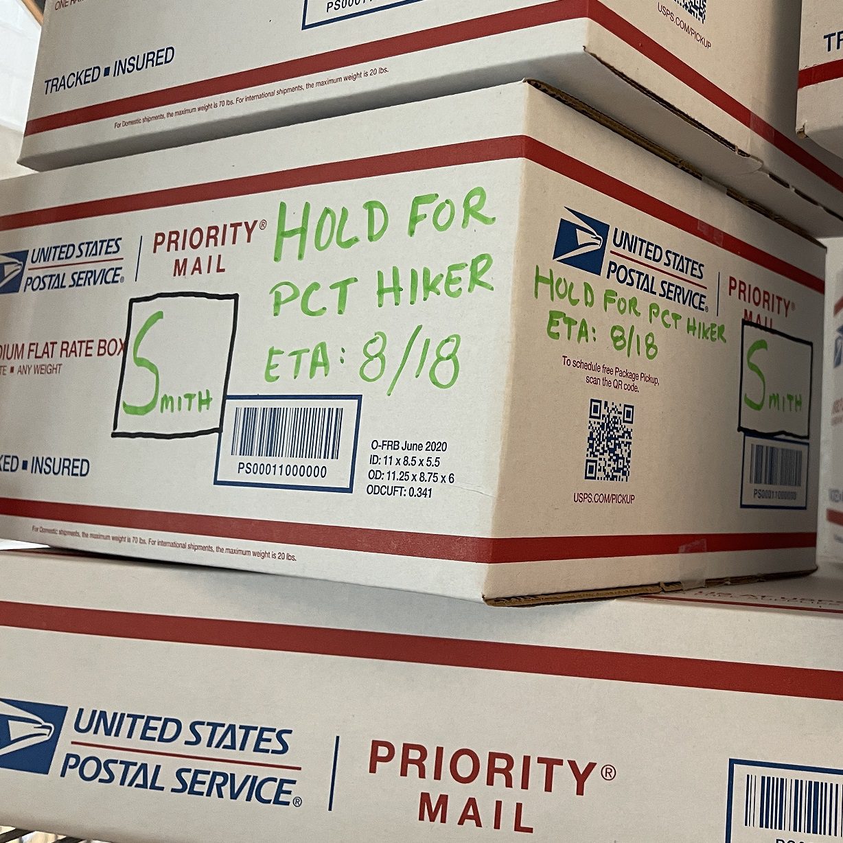 photo of hiker packages in a mail room