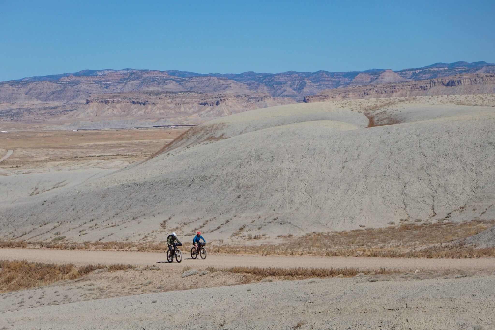 two bikepackers riding on the Bears Ears Loops trail